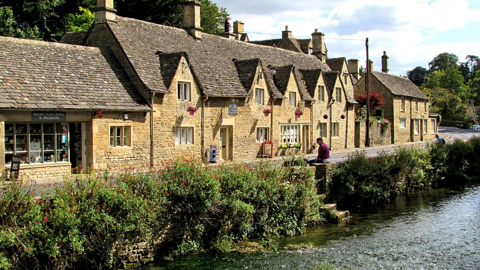 Bibury Post Office and cottages along the River Coln in the Cotswolds